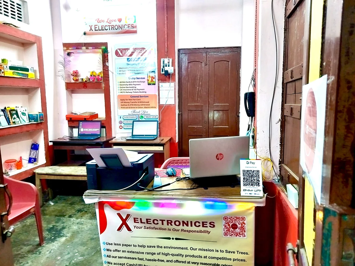 Inside the X ELECTRONICES digital service centre in Liluah Howrah with computers and customer service desk